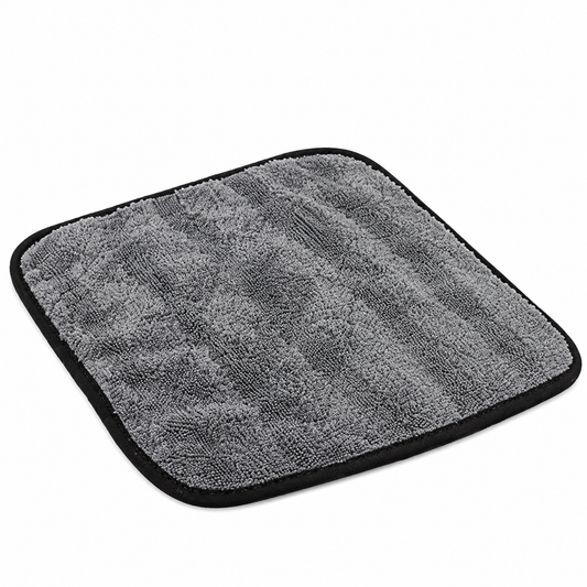 Gray microfiber towel with black edging on a white background