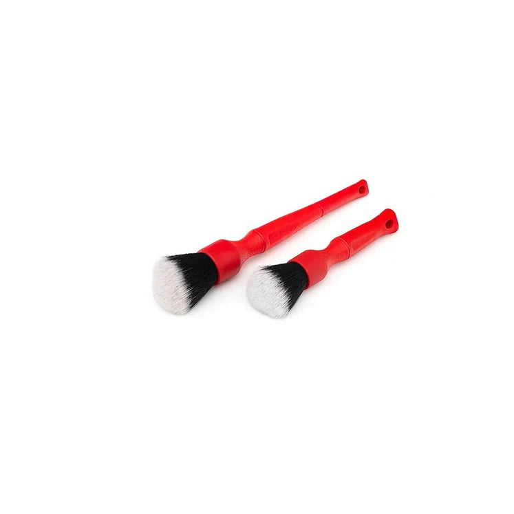 Two red-handled detail brushes, one long and one short